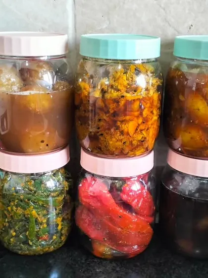 Here is a lineup of some of my most popular products. You can see the different colours and textures of my stuffed red chillies, mix vegetable pickle, and sweet lemon preserve.