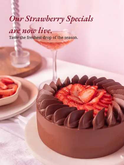 Announcing the launch of our Strawberry Specials with a shot of our Strawberry Ganache Cake, ready to be enjoyed.