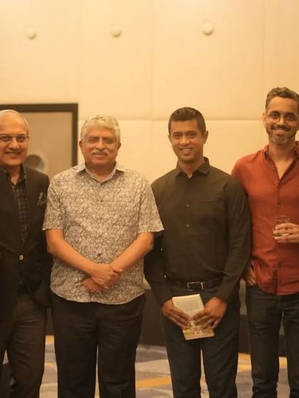 More guests and our team members gather for a photo, highlighting the networking and community aspect of the events we host.