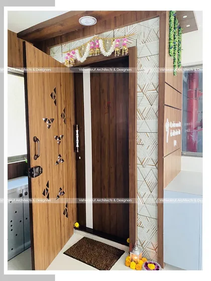 A view of the entrance from inside the home, showing the safety door open. The design on the safety door complements the main door, ensuring a cohesive look.