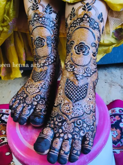 A beautiful bridal feet design with a mix of florals and checkered patterns, and a dark, rich stain.