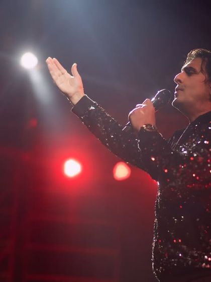 The legendary Sonu Nigam, lost in his melody under the spotlight. A powerful shot from his Roorkee concert, capturing the emotion and energy of his live performance.