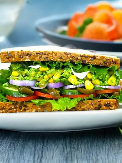 Who says traditional can't be trendy? I've turned the classic winter favourite into a Corn Cheese Sarson Da Saag Sandwich. It's a flavour explosion, served on wholesome multigrain bread for a modern, healthy twist on a classic.