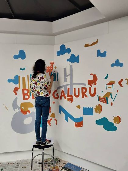 Bhavishya adding color to the Xiaomi mural. We always start with a sketch and then block in the colors before adding the final details.