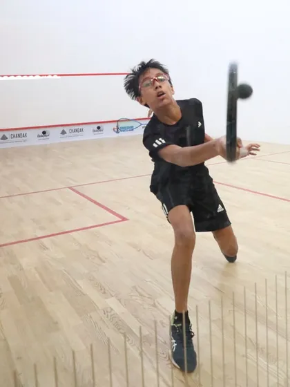 A junior player hitting a forehand with perfect form. Our events are where future champions are forged.