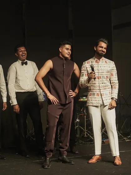 A candid moment of fun with the groom's friends. My quick wit and playful banter help create a relaxed and enjoyable atmosphere for everyone.