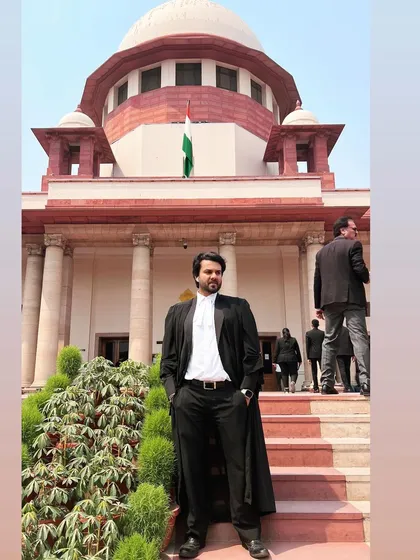 A confident stance outside the Supreme Court. As a criminal trial attorney, projecting strength and readiness is part of the job.