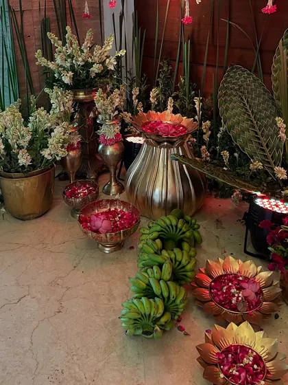 More details of the traditional decor corner, with fresh bananas and flowers, often used in auspicious ceremonies.