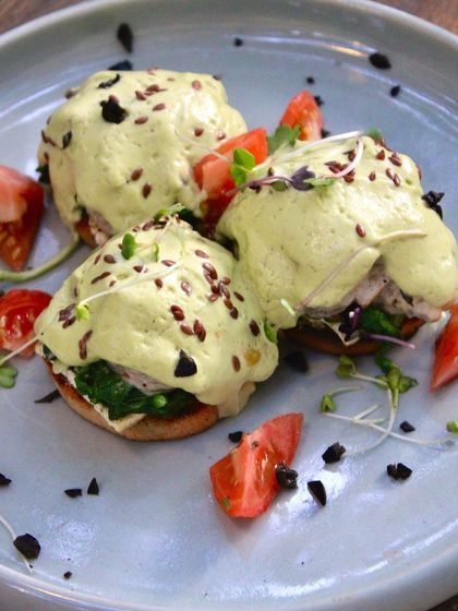 Introducing our Mushroom Benedictine, a revolutionary new addition to our menu. It's a unique combination of flavors with sautéed mushrooms, wilted spinach, and grilled tofu on our in-house baguette.