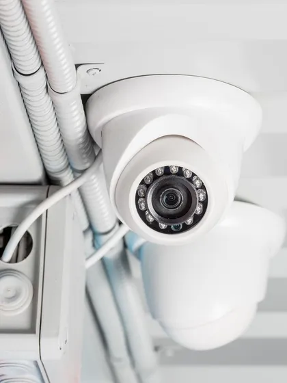 A close-up of a 4K resolution dome camera we installed. The ring of infrared LEDs provides clear night vision, ensuring your property is monitored with high-quality footage 24 hours a day, even in complete darkness.