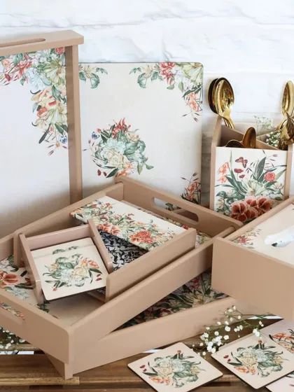 Our floral collection, featuring a beautiful assortment of matching trays, coasters, placemats, and holders. The soft, neutral tones and delicate floral print bring a timeless elegance to any space.