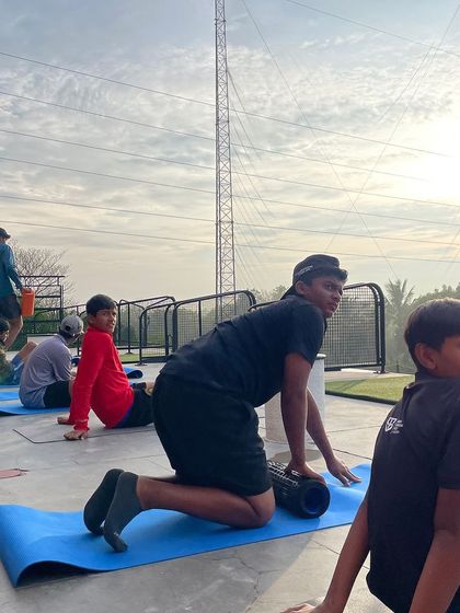 Players using foam rollers for recovery. Learning to take care of their bodies is a skill that will serve them for life.