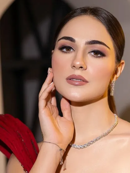 A beautiful portrait showcasing the elegant diamond necklace. The styling is all about timeless glamour.