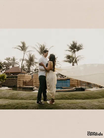 A candid shot of the couple enjoying a quiet moment together during their pre-wedding festivities.