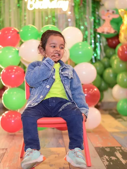A little guest looking absolutely adorable at a party. Every child is a star at our celebrations.