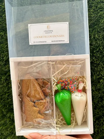 Our Gingerbread Cookie Decoration Kit is a box full of festive fun. It includes wholewheat and jaggery cookies, naturally colored icing, and sprinkles, making it a healthy and creative activity for the whole family.