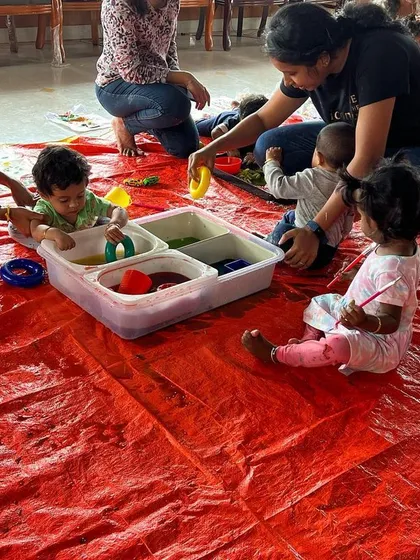 I love seeing parents and babies exploring together. I set up a dedicated area for the youngest children with age-appropriate sensory bins so they can play and learn at their own pace.