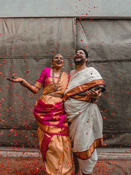 Pure, unscripted happiness. We love creating moments of spontaneous fun during our shoots, like this joyful shower of petals, which results in the most genuine smiles and cherished memories.