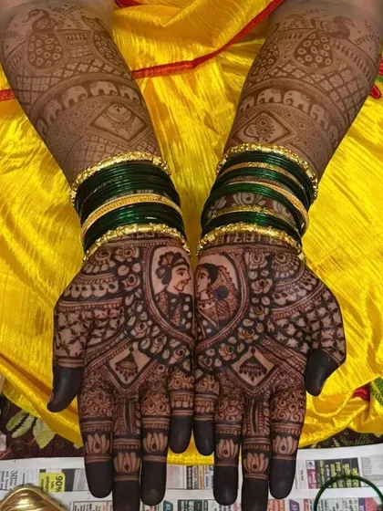 The result of my all-natural henna paste is a deep, rich stain. This photo shows the beautiful dark color after the henna has been removed, highlighting a custom bride and groom portrait.