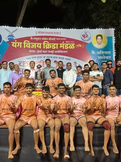 The team on the victory stage, celebrating our win in the first-grade men's district tournament.