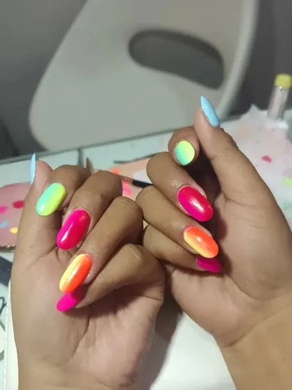Neon ombré nails are perfect for summer. Book an appointment to try something unique from my summer catalog.