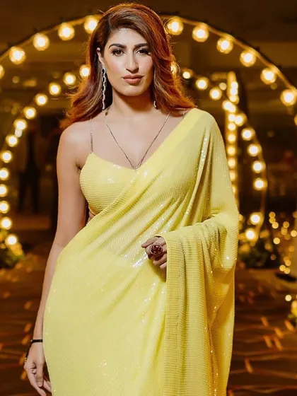 Stealing hearts with this look. Soft, beachy waves are the perfect complement to a chic and modern saree for a cocktail event.