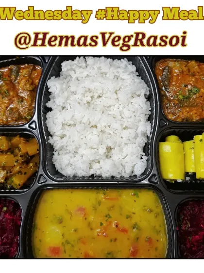 A simple yet complete meal with dal, rice, pumpkin sabji, snake gourd sabji, beetroot salad, and soft, savory khandvi.
