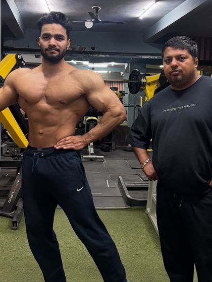Training and posing with my athlete. Join us if you want the best results and a physique that commands attention.