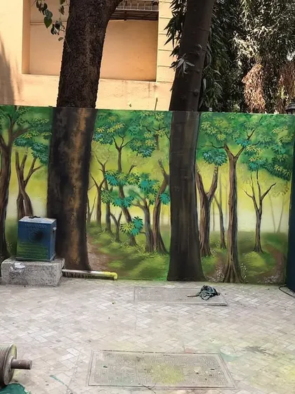 Another angle of the forest path mural, showing how it creates a sense of depth and tranquility in the outdoor area.