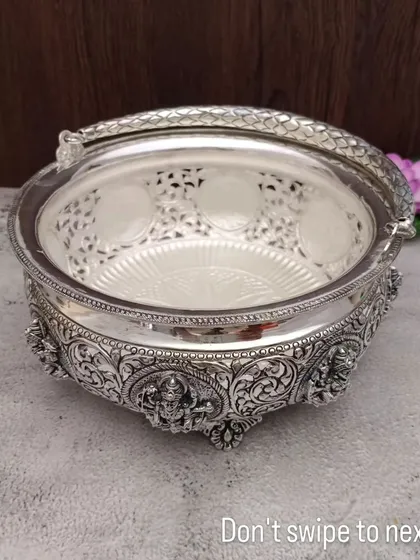 A duplicate image of the beautiful antique Lakshmi basket, perfect for carrying flowers to the temple.