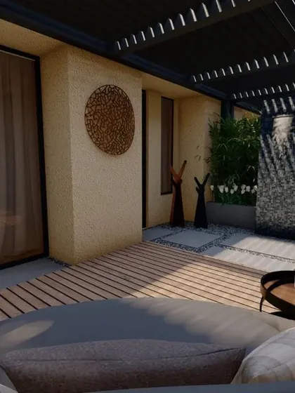 Another perspective of the hotel suite's private garden, showing the relationship between the indoor space and the outdoor leisure deck. The design emphasizes a seamless flow between the two, enhancing the sense of luxury.