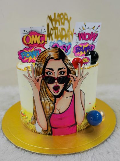 A still image of the eye-catching pop-art cake, perfect for a "boss girl" who loves to make a statement.
