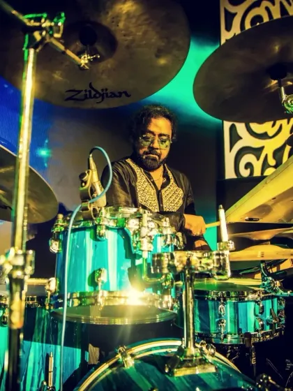 Our drummer, deep in concentration, at the JW Marriott. The foundation of our sound.