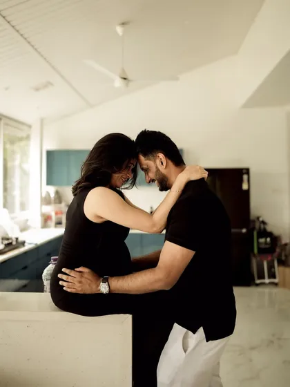 Your story doesn't always have to be in a grand landscape. A cozy, indoor lifestyle session, like this one in a modern kitchen, can be just as beautiful and intimate. It’s about capturing your real life and love in the comfort of your own space.