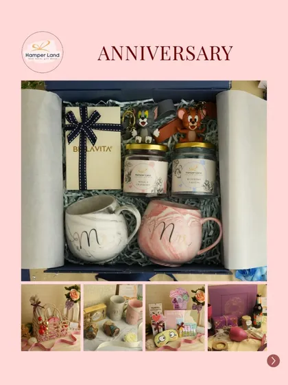 A closer look at one of my popular anniversary hampers. This one includes 'Mr & Mrs' mugs, premium perfumes, and cute Tom and Jerry figurines to represent a playful relationship, all packed in a classic blue box.