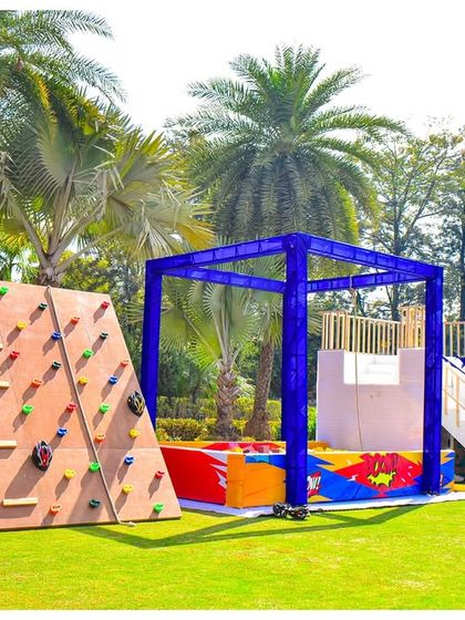 To keep the little heroes busy, I set up a custom-built training ground. This included a rock-climbing wall and a soft play area, all designed to fit the Avengers theme and provide hours of safe, active fun.