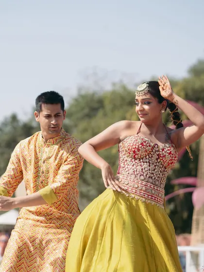For Mishi's mehndi, it was all about fun and movement. Her makeup, featuring a pop of color on the eyes, was designed to be vibrant and stay put while she danced and celebrated with her family and friends.