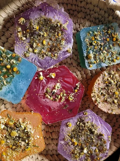 A beautiful collection of my handmade Chamomile soaps, ready to be packed. I top each bar with real chamomile flowers, known for their calming and soothing properties, making this soap gentle enough for sensitive skin.