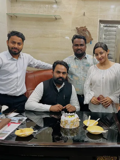 Celebrating a colleague's birthday in the office. Our team is like a family, and we share in each other's personal celebrations.