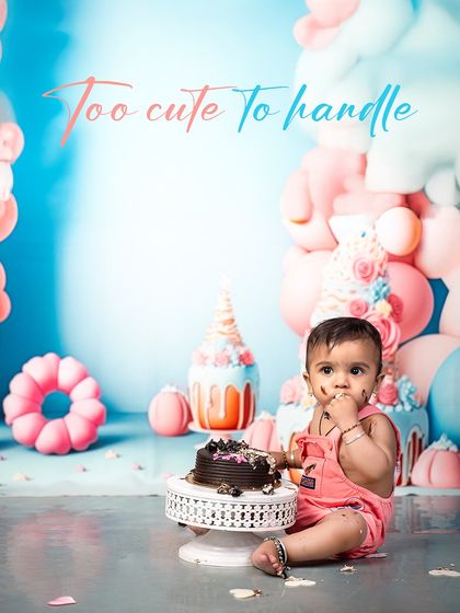 Too cute to handle! This little one is caught mid-bite during his chocolate cake smash, a perfectly messy and adorable moment from his first birthday celebration.