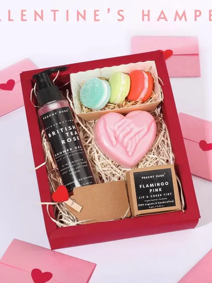 My special Valentine's Day hamper, designed to share the love. It includes a romantic British Tea Rose shower gel, a heart-shaped shea butter soap, and even some cute macaron-shaped soaps.