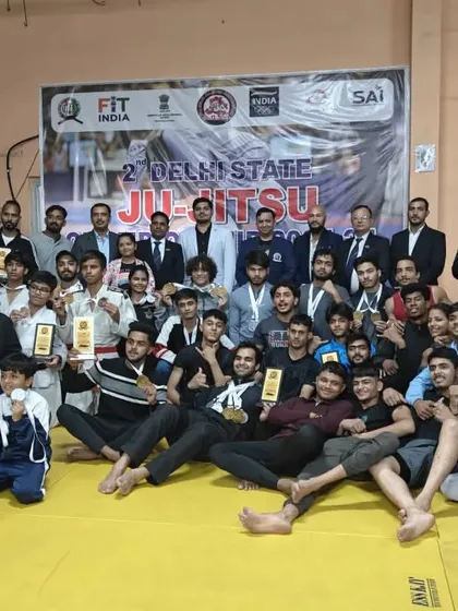 The entire team celebrating a successful day at the Ju-Jitsu championship. We believe in strength in numbers and collective success.