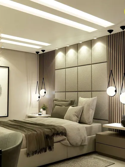 Another shot of the beautiful bed with its upholstered headboard and statement pendant lights. The design creates a perfect balance of comfort and luxury.