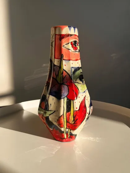 A third view of the ceramic vase.
