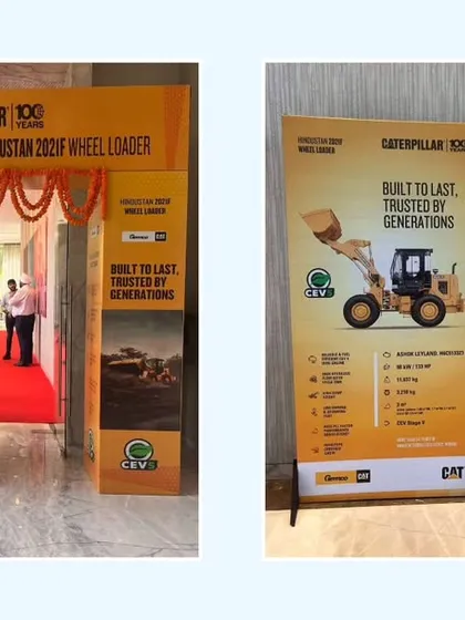 Branding needs to be consistent at every point. For the Caterpillar launch, we created a branded entrance arch and standees that guided guests and reinforced the event's theme from the moment they arrived.