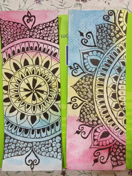 A pair of beautiful mandala bookmarks created by students. They combined intricate line work with soft watercolour backgrounds for a lovely effect.