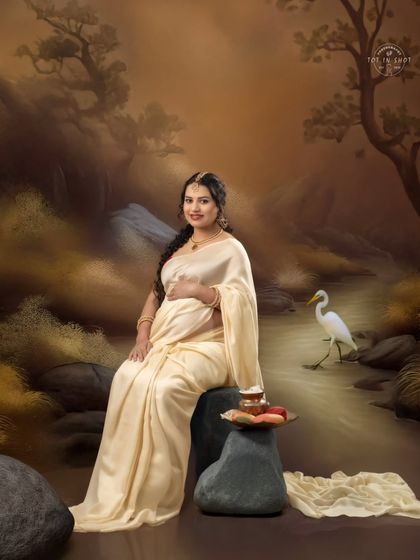 A painterly composition of a mom-to-be seated by a serene, painted river scene, evoking a sense of calm and connection to nature.