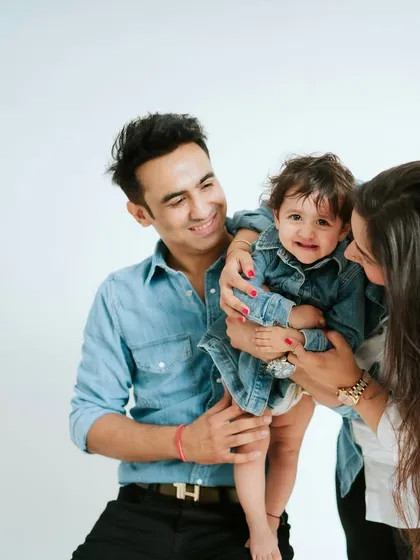 A family that twins in denim together, stays together. This coordinated look is fun and creates a cohesive family portrait.