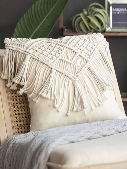 Add texture to your sofa or chair with our macrame cushion covers. This design features a V-shaped pattern with a long fringe, perfect for a boho or modern home.
