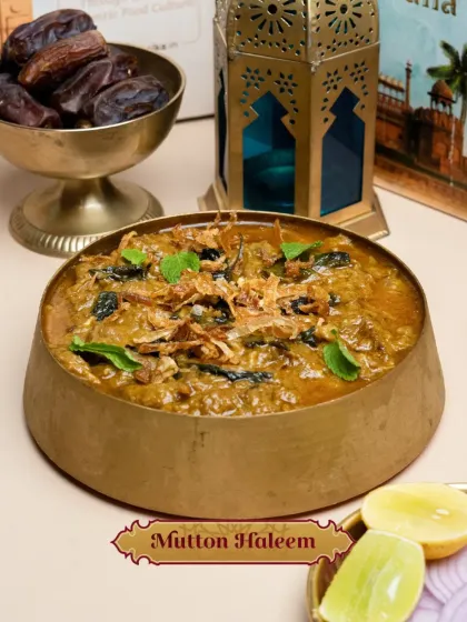 A close-up of our rich and wholesome Mutton Haleem, garnished with fried onions, a true taste of tradition.